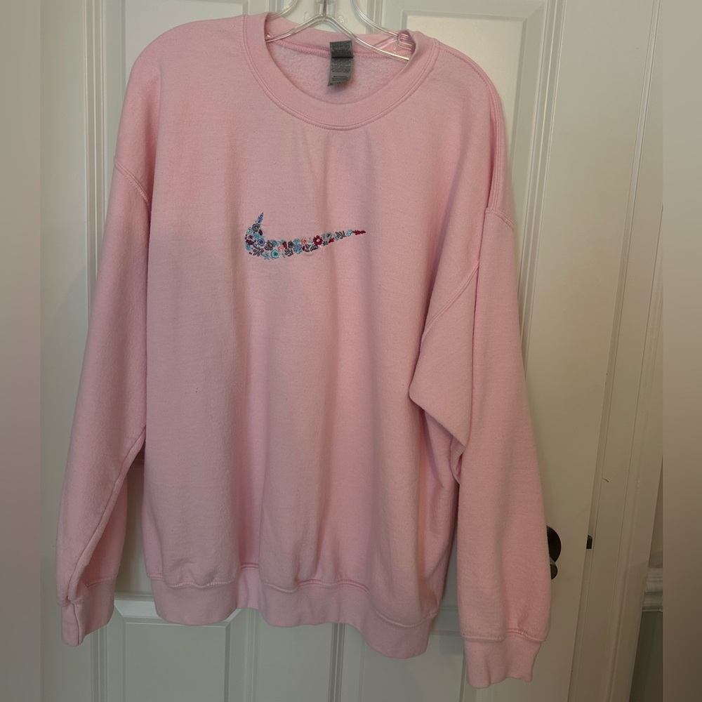 Hand stitched Nike swoosh sweatshirt